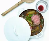 Linseneintopf mit Kartoffeln und Würstchen