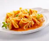 Fagottini mit Ricotta und Tomate