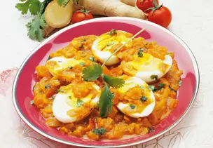 Hartgekochte Eier mit scharfer Tomatensauce