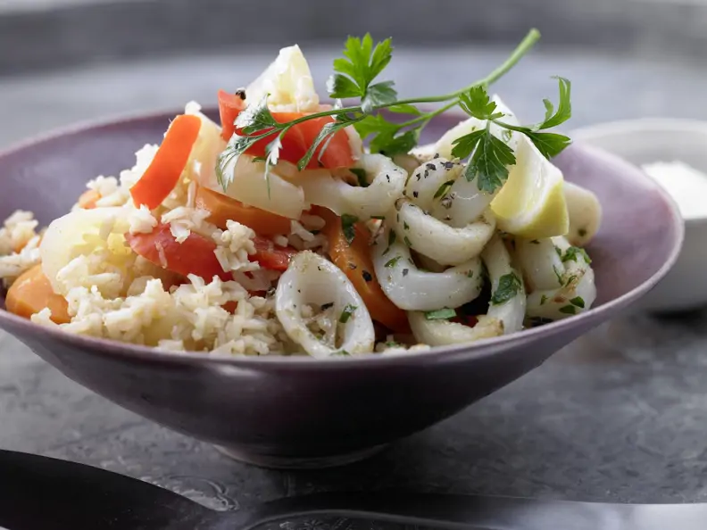 Risotto mit Tintenfischringen