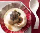 Pflaumenknödel mit Orangensauce