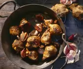 Topinambur mit Knoblauch aus der Pfanne