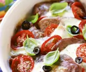 Schweinebraten mit Tomaten und Mozzarella