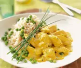 Geflügelcurry mit Erbsen und Reis
