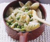 Erbsen-Schwarzwurzel-Gemüse mit Butter