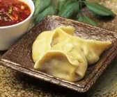 Gedämpfte Teigtaschen mit Fleisch gefüllt