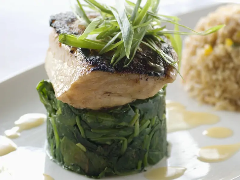 Loup de mer auf Spinat