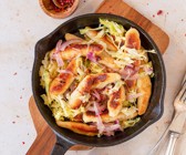Schupfnudeln mit gebratenem Spitzkohl und roten Zwiebeln