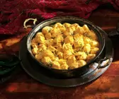 Geflügel in Currysoße auf indische Art (Chicken Korma)