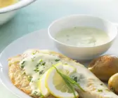 Tilapia mit Senf-Estragon-Soße und Pellkartoffeln