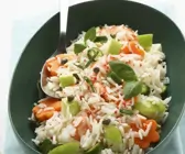 Fruchtiger Reis mit Karotten, Kräutern und Pecorino