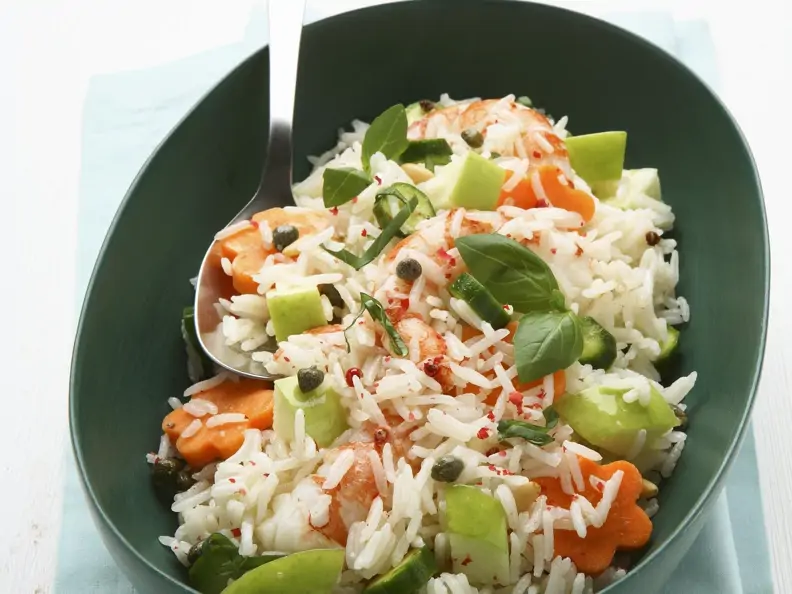 Fruchtiger Reis mit Karotten, Kräutern und Pecorino