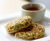 Spaghettiküchlein mit Lauchzwiebeln