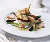Wachtel mit Risotto und Auberginen