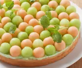 Waldmeisterkuchen mit Melonen