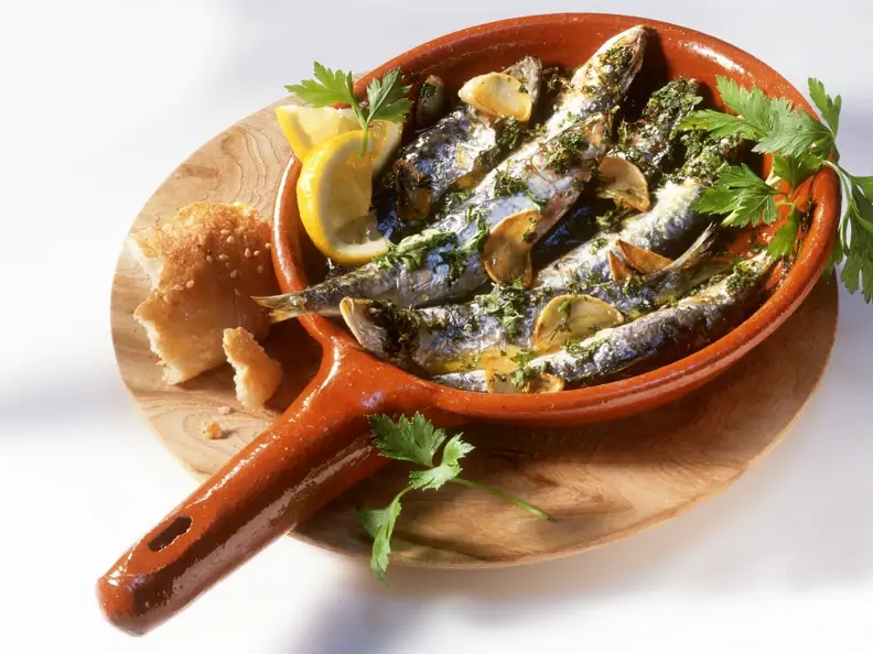 Sardinen mit Knoblauch und Kräutern