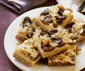 Milchreis-Zwetschgen-Kuchen mit Mandeln