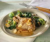 Koteletts mit Knoblauch dazu Spinat