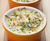 Fischauflauf mit Pinienkernen