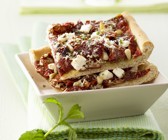 Pizza mit getrockneten Tomaten