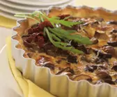Quiche mit Pilzen und getrockneten Tomaten