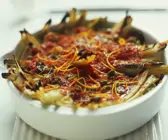 Fenchel-Tomaten-Auflauf mit Oliven und Orangenabrieb