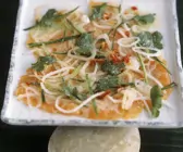 Lachs in Marinade mit Gurke und Koriander auf vietnamesische Art