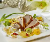Ente mit Currysauce und Gemüse
