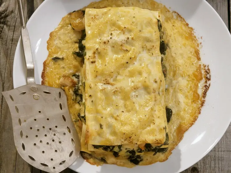 Lasagne mit Shrimps, Calamari und Spinat