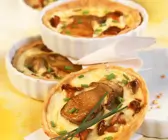 Kleine Quiches mit Pilzen