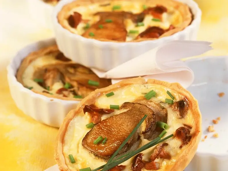 Kleine Quiches mit Pilzen