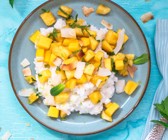 Limetten-Kokos-Milchreis mit Mango-Ananas-Salat und Minze