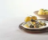 Gefüllte Weinblätter mit Reis und Tomaten