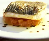 Loup de mer mit Tomaten