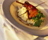 Kaninchen auf Risotto