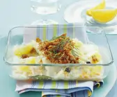 Fischauflauf mit Bröselhaube und Orangen