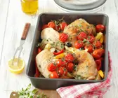 Hähnchenschenkel im Backofen mit Tomaten