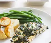 Fisch mit Kräuterhaube