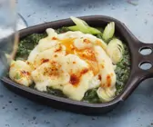 Raclette mit Spinat und Ei
