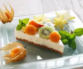 Käsekuchen mit exotischen Früchten