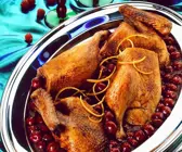 Orangen-Ente mit Kirschen