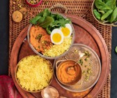 Reisbowl mit Kurkuma und Süßkartoffelpüree