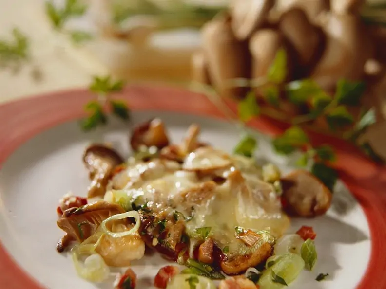 Raclette mit Pilzen und Speck