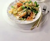 Farfalle mit Artischockenböden und Parmaschinken