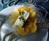 Pistazieneis auf marinierten Orangen- und Grapefruitfilets