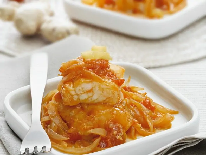 Curry vom Stockfisch mit Tomaten und Zwiebeln