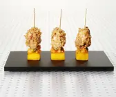 Mango mit Austernspieß