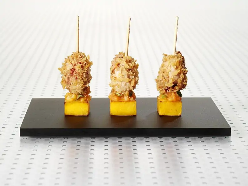 Mango mit Austernspieß