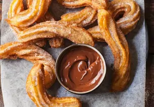 Churros mit Schokolade