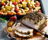 Schweinerücken mit Kräutern und Ofenkartoffeln